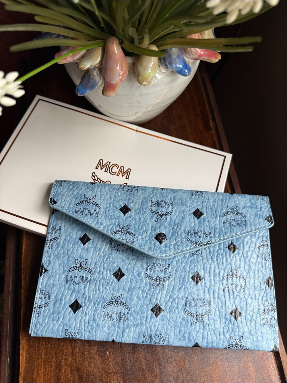 NWT MCM envelope clutch in powder blue leather.